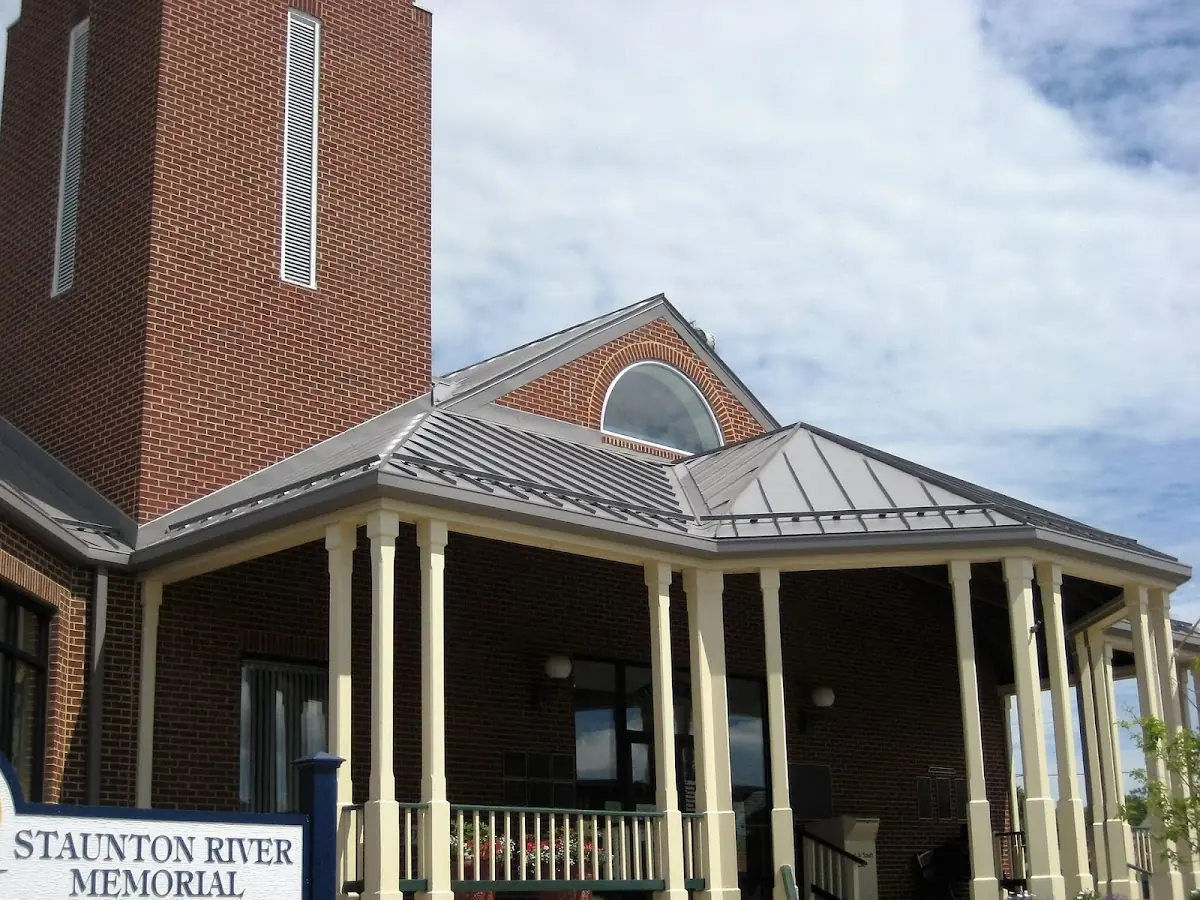 Skilled roofing craftsmen working on a residential roof in Larkfield-Wikiup